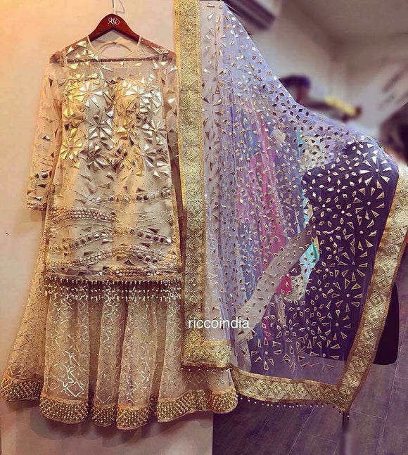 Leather and gota work gold sharara with heavy dupatta