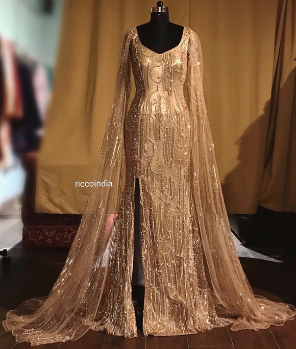 Mermaid gold couture gown with cape